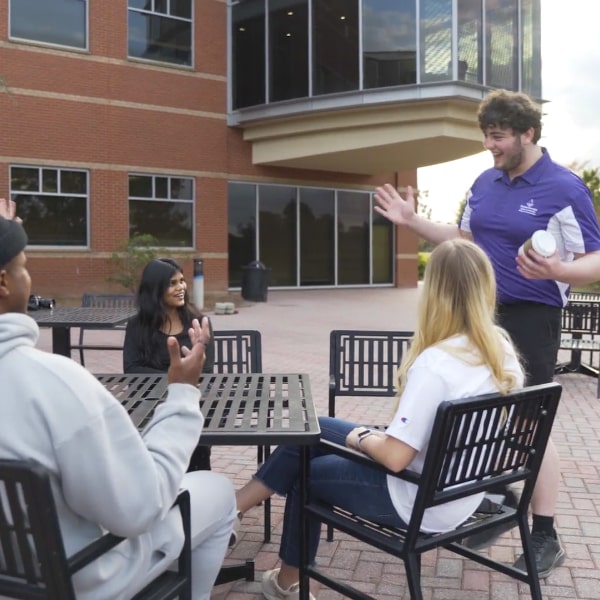 Students Hanging Out Outside of the PSC Building