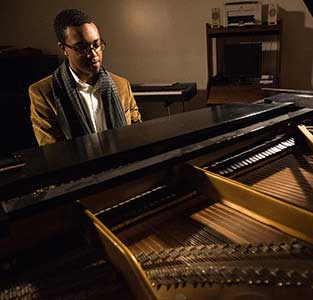 Student playing the piano