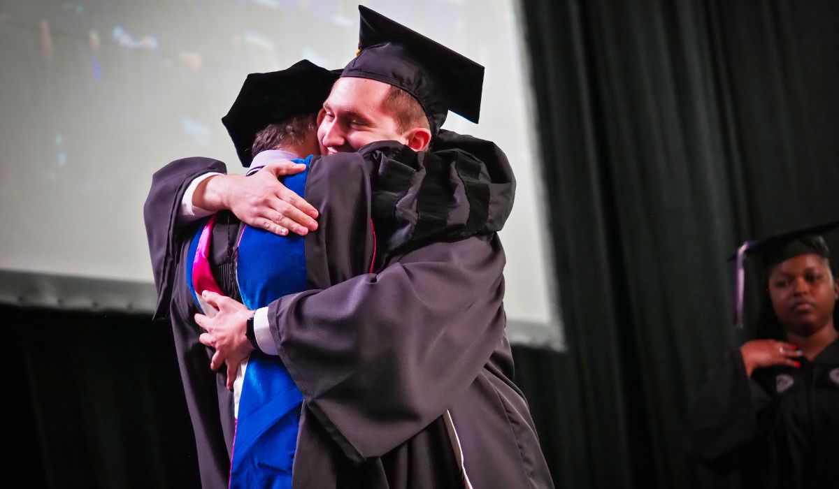 hug during graduation