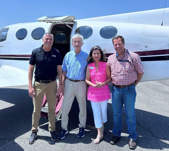 L-R are School of Aviation Dean Adon Clark, Donor Mr. Marshal Mize,  Advancement VP Nancy White, and Pilot Mr. Keith Clark.